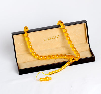 BAKELITE ROSARY IN AN AMBER COLOR